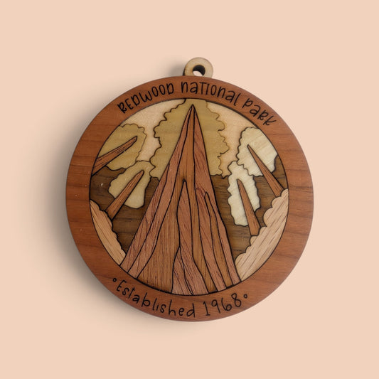 Flo's Banana Stand handcrafted wooden Redwood National Park ornament with layered tree and forest detailing.
